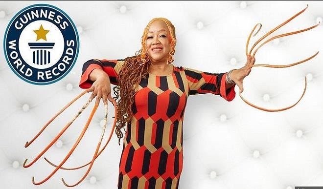 This Woman Holds The Record For The Longest Nails And She's A World-Class  Gem