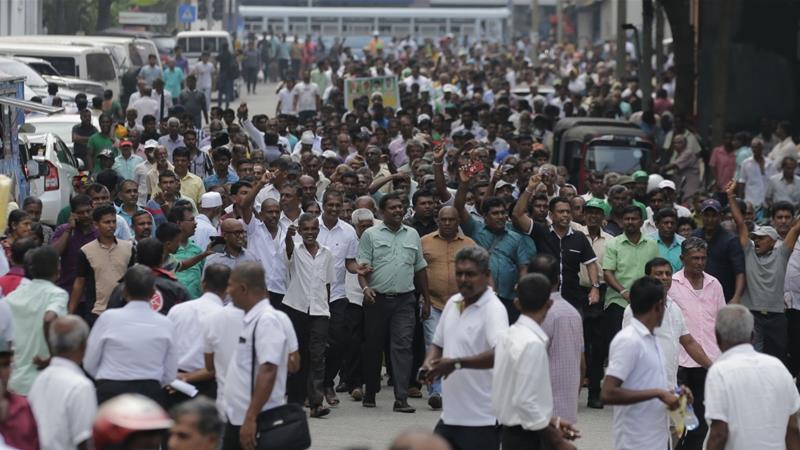 Protesters break into Sri Lanka PM’s office after being named acting president