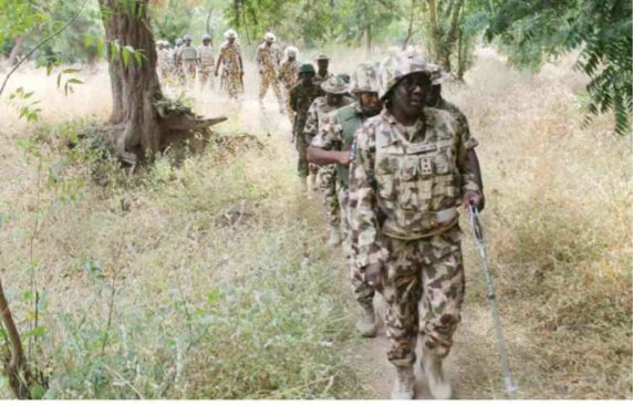The Acting General Officer Commanding (GOC) 7 Division Brig.- Gen. Abdulmalik Bulama Biu leads other officers, during his operational visit to assess the combat readiness of troops of 82 Task Force Battalion in Ngwoshe, Gwoza Local Government Area of Borno State.