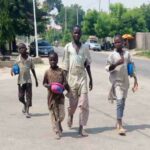 School age children beg on a GRA street in Kano recently