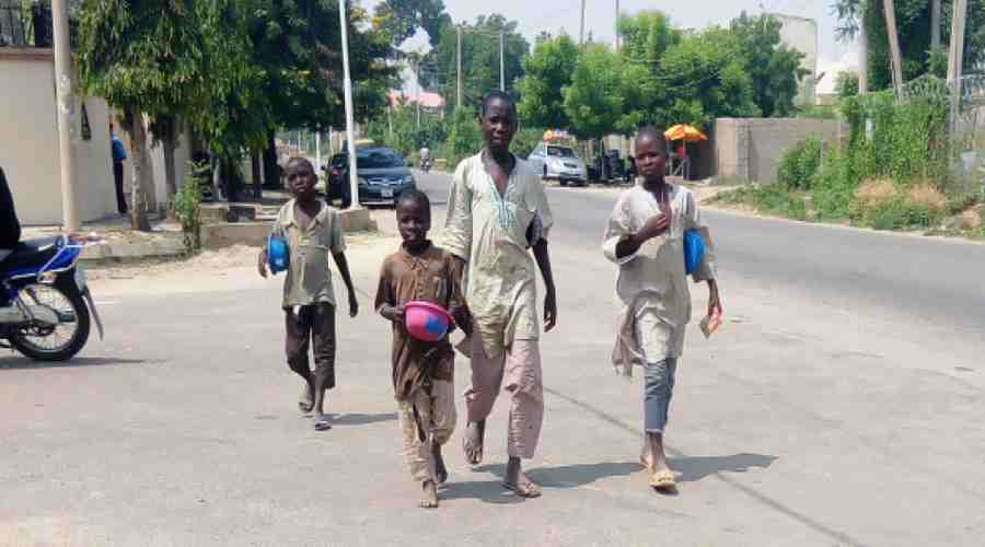 School age children beg on a GRA street in Kano recently