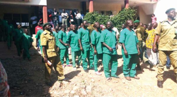 Nineteen of the 28 suspects standing trial for the alleged murder of retired Maj.- Gen. Idris Alkali, being led to a prison’s vehicle after their case was heard at the Plateau State High Court in Jos recently.