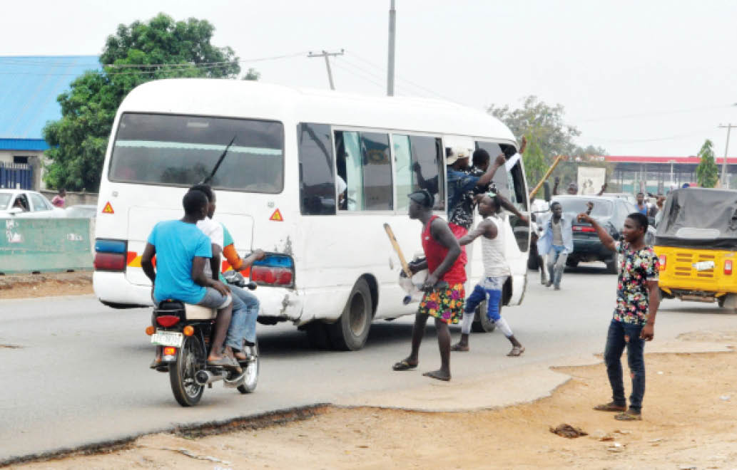 Youth besiege Abuja block roads celebrating Buhari s victory