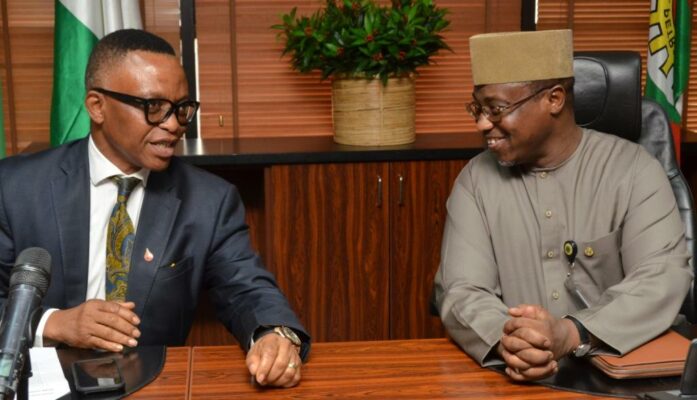 The chairman of the Petroleum Technology Association of Nigeria (PETAN), Mazi Bank Anthony Okoroafor , with the NNPC GMD, Dr. Maikanti Baru, during a courtesy call on the GMD at the NNPC Towers, Abuja on Tuesday.