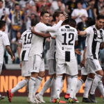Juventus' Portuguese forward Cristiano Ronaldo (C-L) celebrates with teammates after Fiorentina scored an own goal following Ronaldo's shot during the Italian Serie A football match Juventus vs Fiorentina on April 20, 2019 at the Juventus stadium in Turin. (Photo by Marco Bertorello / AFP)
