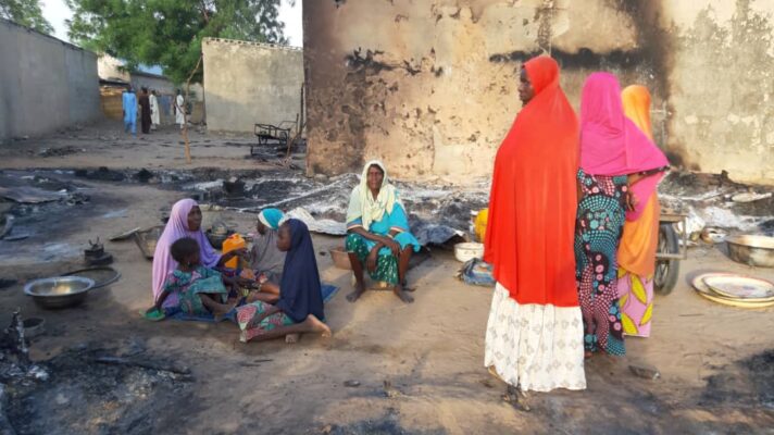 Survivors hang around the Molai general area after their houses were burnt down by the Boko Haram insurgents on Tuesday night.