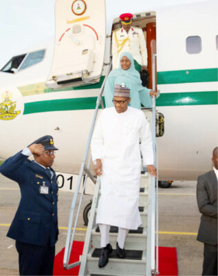 President Muhammadu Buhari and his wife, Aisha arrive at the Nnamdi Azikiwe International Airport in Abuja from Saudi Arabia yesterday
