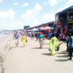 FILE PHOTO: Traders displaying wares by the road side