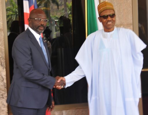 Liberian President, George Weah with Nigerian President, Muhammadu Buhari at the State House in Abuja.
