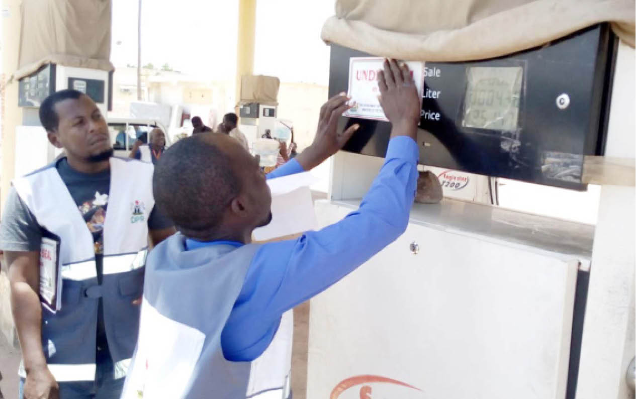 Officials of the Department of Petroleum Resources (DPR) seal a filling station in Gombe, during their surveillance operations around the city
