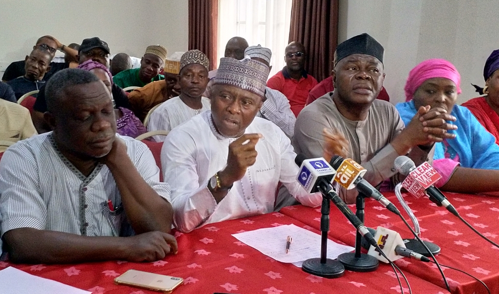 L – R: A former acting governor of Kogi State, Clarence Obafemi; Spokesman, Abubakar Ibrahim Campaign Organisation, Shaba Ibrahim; PDP governorship aspirant, Alhaji Abubakar Mohammed Ibrahim; and Zonal coordinator (East), Abubakar Ibrahim Campaign Organisation, Mrs. Joy Onu, during the briefing on Wednesday in Abuja. PHOTO BY: Abbas Jimoh