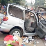 The scene of an accident where seven passengers lost their lives at Gada-Biyu village, along the Abuja-Lokoja highway on Tuesday morning Photo: Abubakar Sadiq Isah