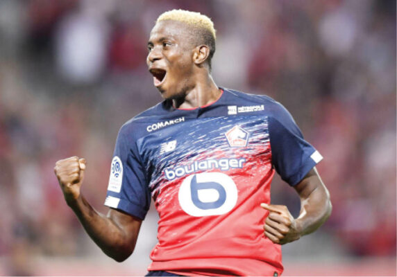 Super Eagles striker, Victor Osimhen celebrates after scoring a goal for Lille in the French league.