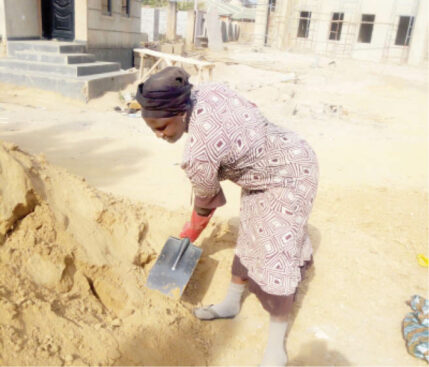 Agnes Lot working at a construction site in Jos