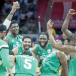 Member of Nigeria’s male senior basketball team, D’Tigers celebrating after a victorious outing.