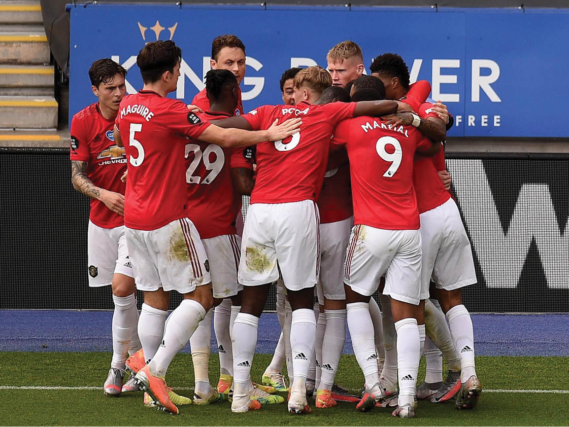 Manchester United players celebrate one of their goals against Leicester City in yesterday’s match