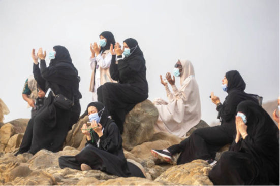 Muslim pilgrims praying on Mount Arafat, also known as Jabal al-Rahma (Mount of Mercy), southeast of the holy city of Mecca, during the climax of the Hajj pilgrimage amid the COVID-19 pandemic yesterday