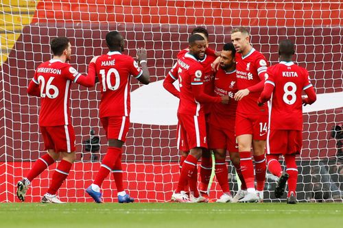 Liverpool players celebrate one of Mohamed Salah's goals against Leeds United
