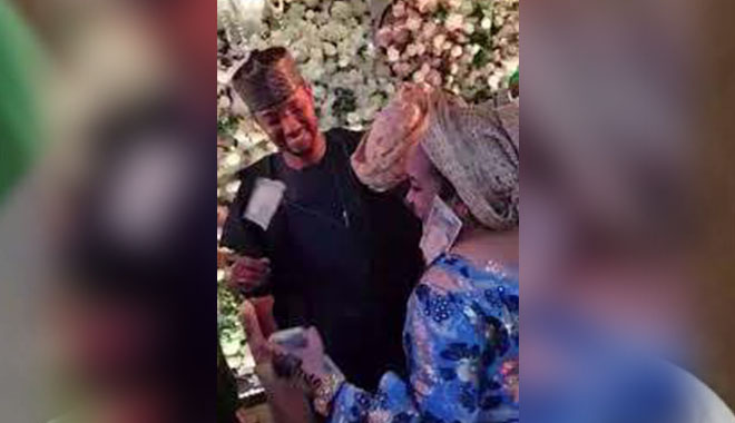 Nigerians flay ‘naira rain’ at Buhari’s daughter’s wedding