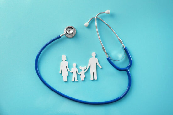 Family figure and stethoscope on color background. Health care concept