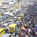 Traders and customers without regards for COVID-19 protocols engage in shopping at Idumota Market in Lagos yesterday