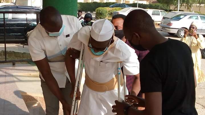 PHOTOS: Mahadi Shehu, Katsina Whistleblower, Appears In Court On Crutches