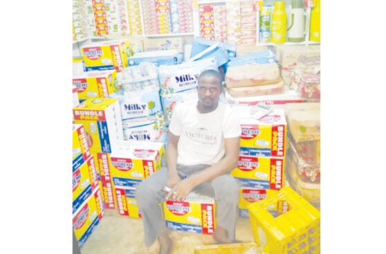 Mohammed Malami sitting in his shop in Gashua at Gashua Central market, Yobe State.
