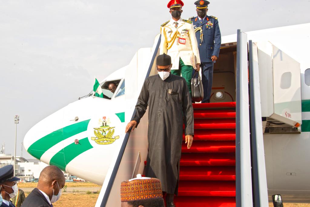 Buhari returns from London