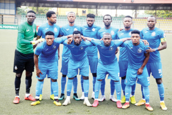 Line-up of Enyimba FC before their match against Sunshine Stars of Akure at the Agege Township stadium in Lagos