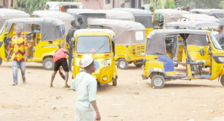 Tricycle operators at a park along Jikwoi road road Abuja