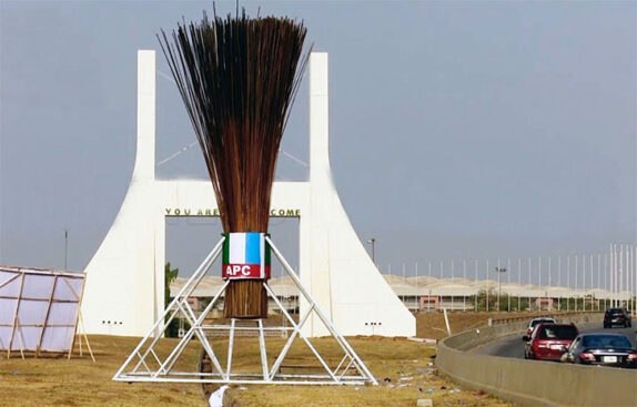 APC's broom statue at City Gate in Abuja