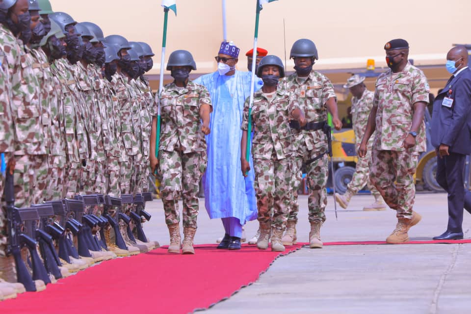 There’s a lot of work to be done, Buhari charges troops