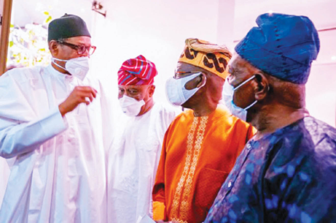 President Buhari discussing with Tinubu and some of his allies during their last visit to Aso Rock