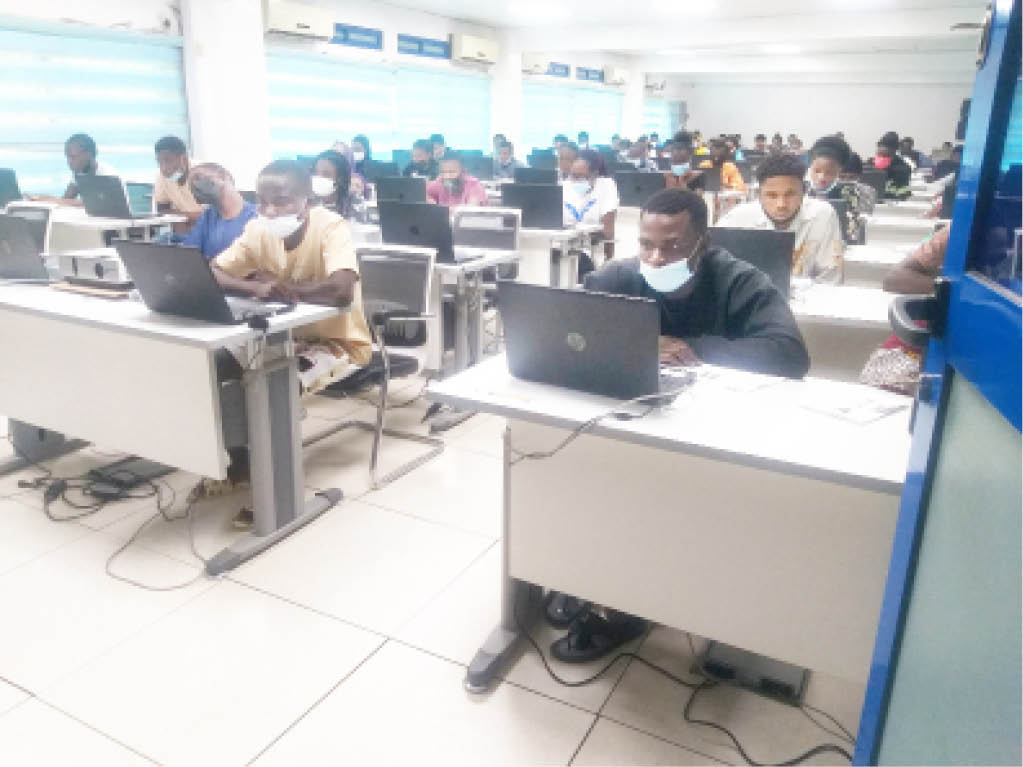 FILE PHOTO: Candidates writing the 2021 Unified Tertiary Matriculation Examination (UTME) at Digital Bridge, Utako, Abuja