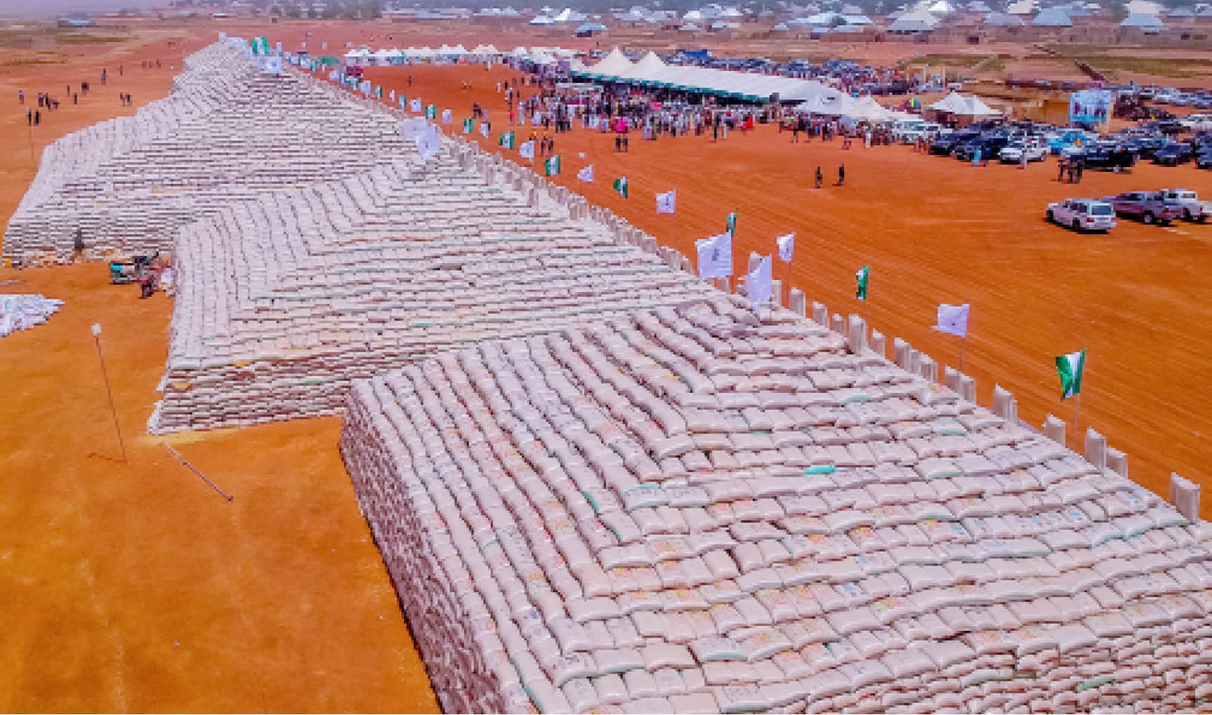 NIGERIA DAILY: Did Buhari Actually Unveil Pyramids of 13 million Bags Of Rice?