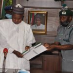 Gov Masari receives the condolence letter from the leader of the delegation, AGC Uba Muhammed