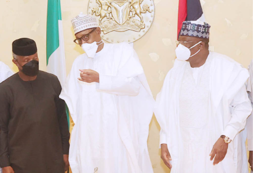 From left: Vice President Yemi Osinbajo; President Muhammadu Buhari and Senate President Ahmad Lawan at the presidential villa Abuja yesterday