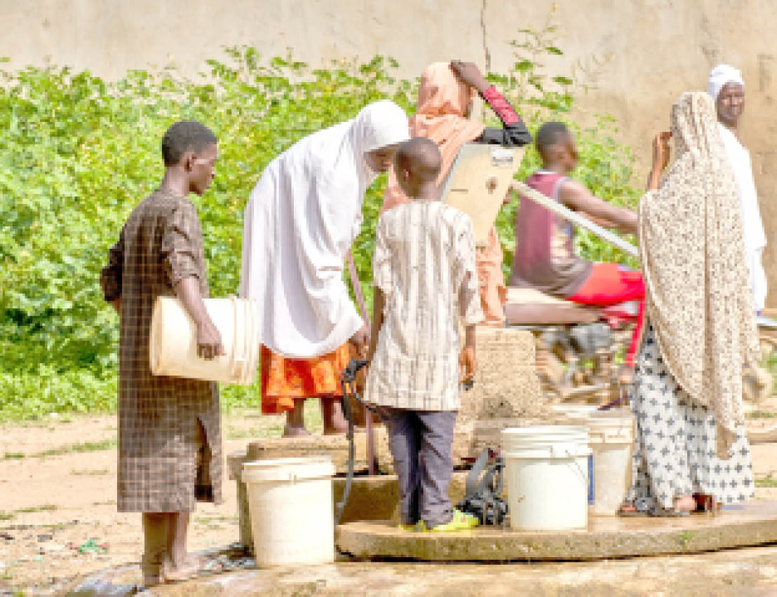 FILE PHOTO: Children fetching water from a borehole in Rano