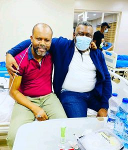 Uche and his Elder brother Leo Edochie in the hospital