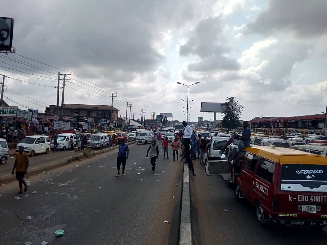 Some commuters trekking following the protest on the Benin-Lagos highway
