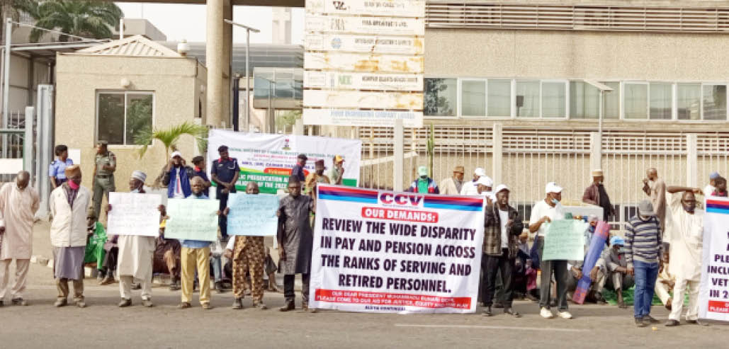 Ex-military personnel during the protest at the entrance of Ministry of Finance in Abuja yesterday