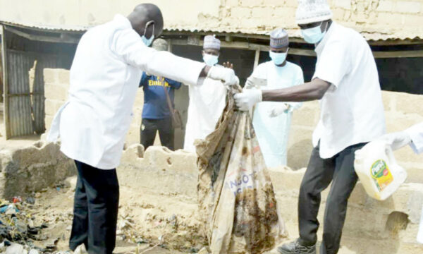 Medical officials of Kano police exhuming the remains of Hanifa