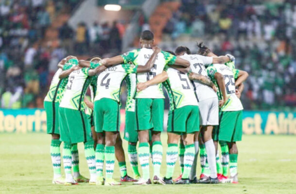 FILE PHOTO: Super Eagles praying after their 2-0 victory over the Wild Dogs of Guinea Bissau on Wednesday. They face the Carthage Eagles of Tunisia tomorrow in Garoua.