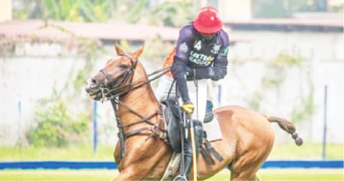 A player turns on the ball during one of the games in the qualifying series of the 2022 Lagos International Polo Tournament