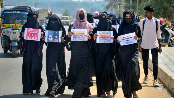 Muslim students wearing burqa protest against the Karnataka High Court's verdict on 'Hijab' by boycotting their internal exams. Credit: PTI Photo