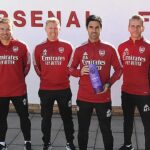 Arsenal coach, Mikel Arteta poses with the Manager of the Month award alongside his technical crew
