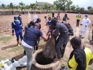 Police operatives exhumed the body of Hussaini Aliyu Takuma, allegedly killed by suspected herdsmen