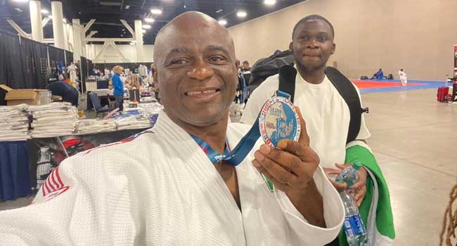 IRT Commander, Tunji Disu, displays his silver medal in the US Open on July 31, 2022