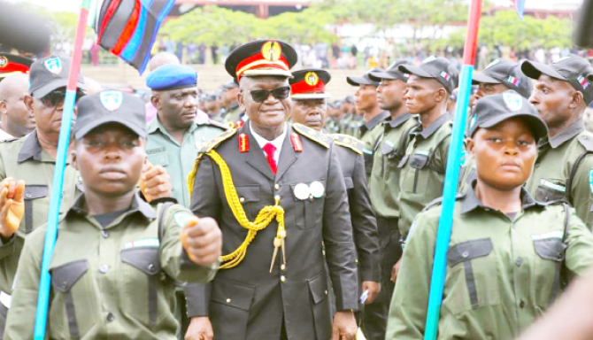 Gov Samuel Ortom of Benue State and the Livestock guards during their passing out parade
