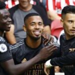 Arsenal players celebrate with Gabriel Jesus after scoring the second goal again Brentford